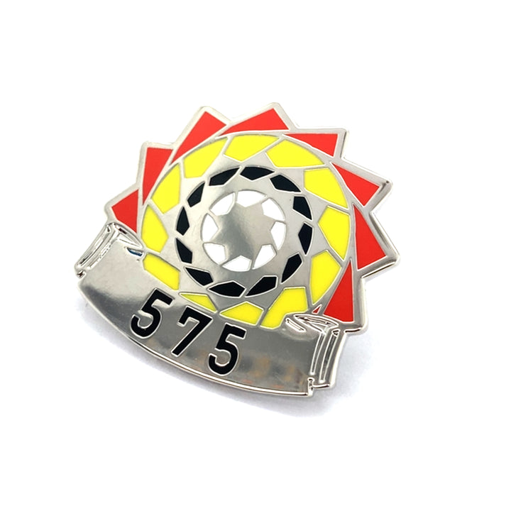 Pinecone Patchwork 575 lapel pin by TPL II featuring colorful patchwork design and a pinecone shape, on a plain background.