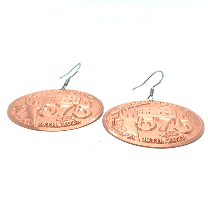 Copper Lumbee Fairness Act earrings by TPL II, featuring intricate metalwork and elegant hoop design, shown on a white background.