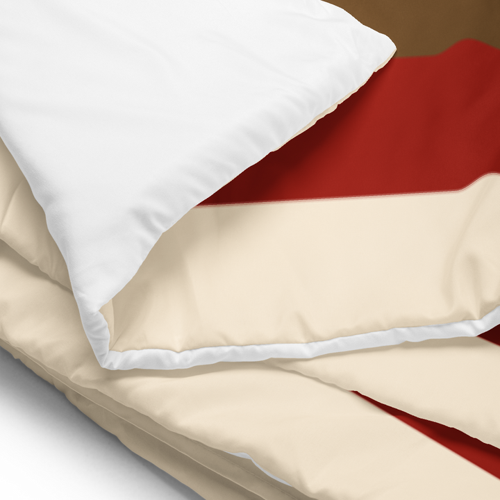 Printfull pinecone patchwork king comforter with fall colors, featuring a cozy printed design on a white background.
