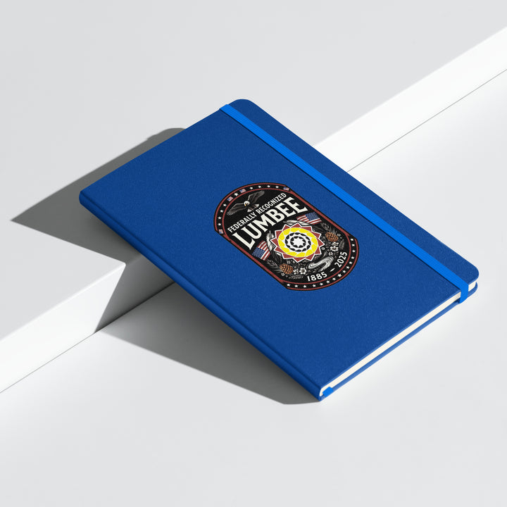 Blue hardcover Lumbee recognition notebook by Printfull, featuring a commemorative design for important cultural recognition.
