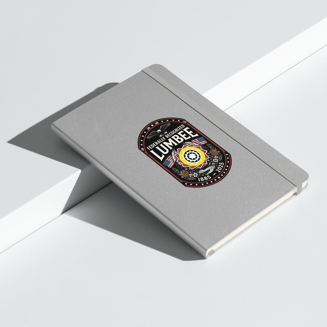Silver hardcover Lumbee recognition notebook by Printfull with embossed design, ideal for commemorative gifts and note-taking.