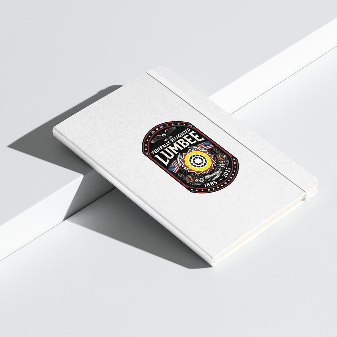 White hardcover Lumbee recognition notebook by Printfull, commemorative gift with embossed design on the front cover.