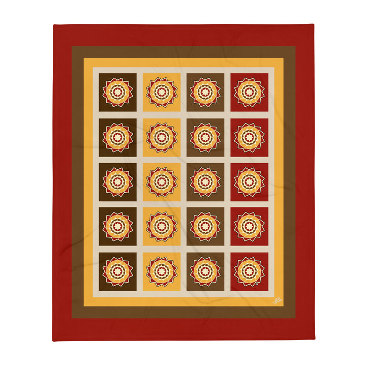 Printfull Pinecone Patchwork Throw Blanket in fall colors, showcasing a cozy, printed 50x60 inch design with pinecone patterns.