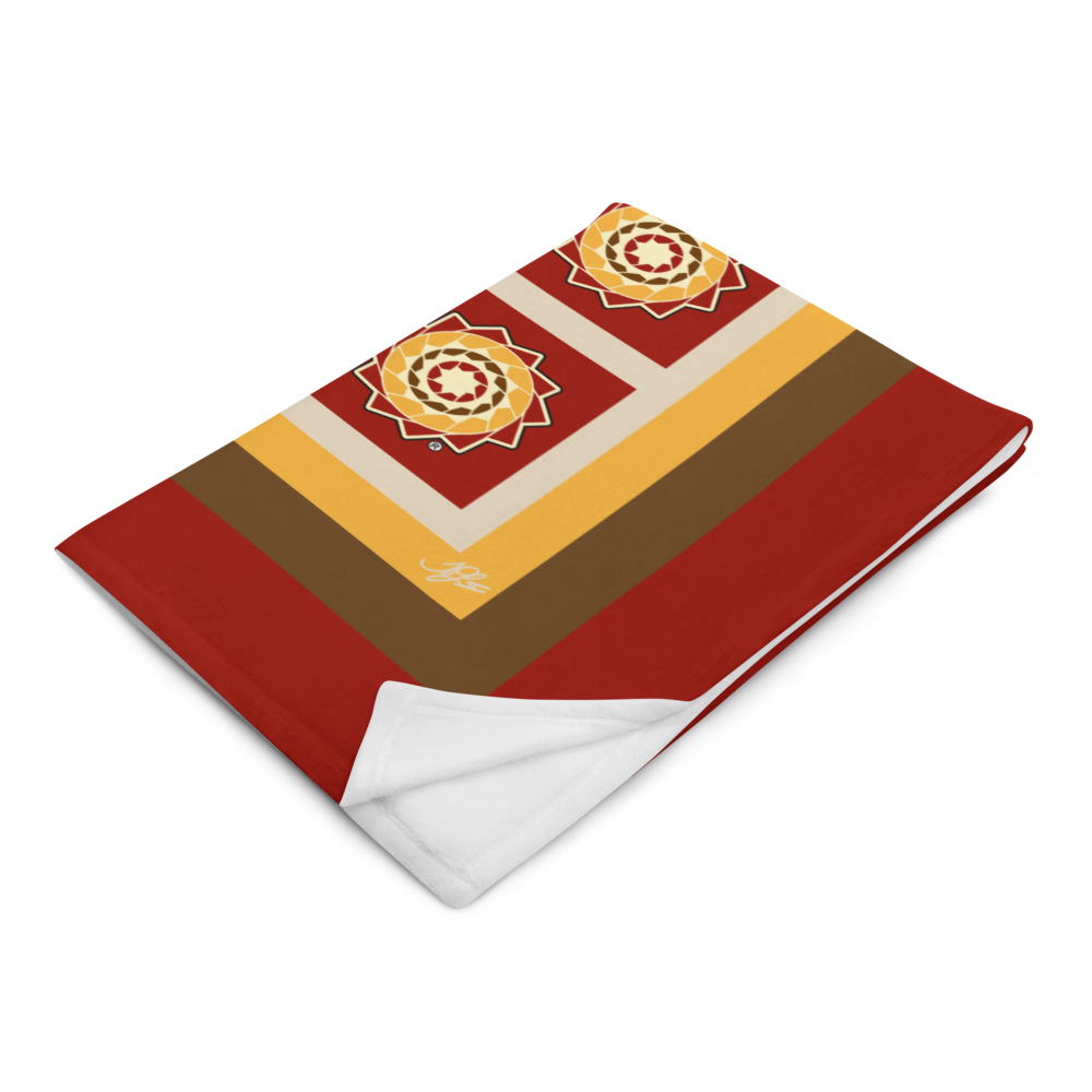 Printfull Pinecone Patchwork Throw Blanket in fall colors, showcasing a cozy, printed design with a 50x60 inch size.