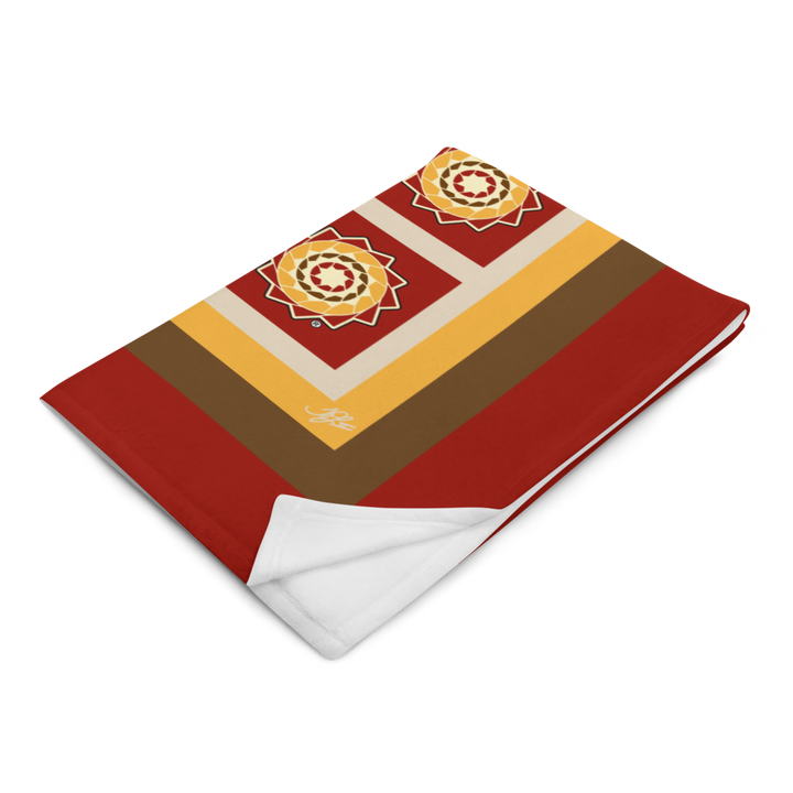 Printfull Pinecone Patchwork Throw Blanket in fall colors, showcasing a cozy, printed design with a 50x60 inch size.